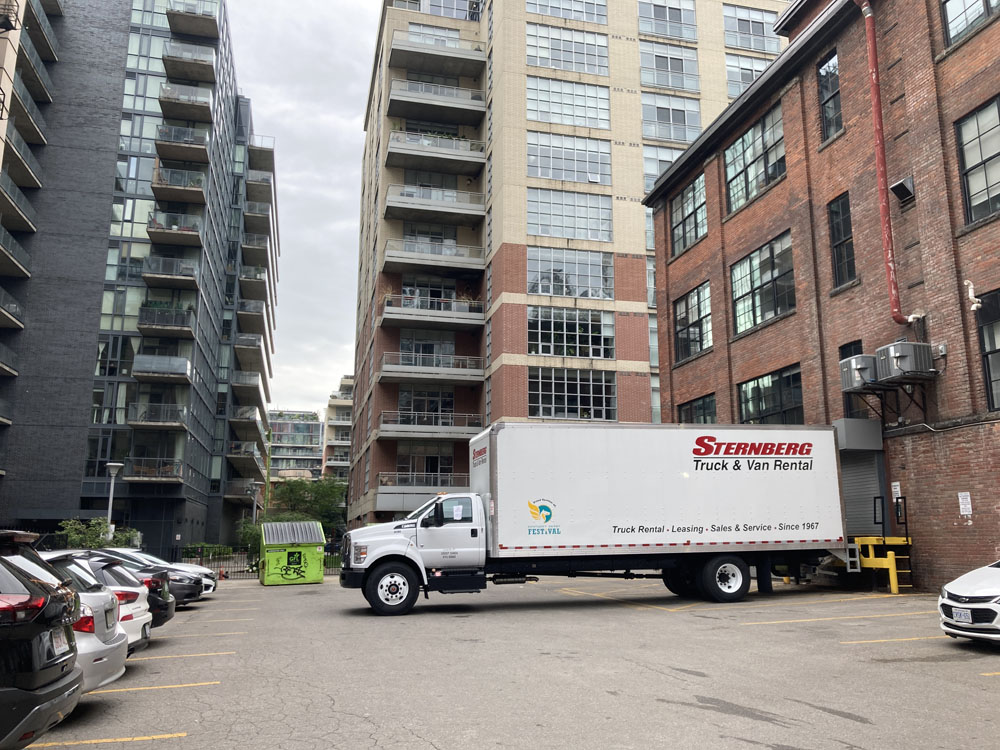 A moving truck outside the building